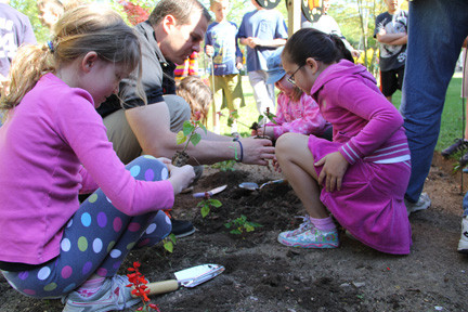 Kathryn Shannon, Alayna Garcia and Carly Hienz planted with teacher Peter Gibbons.