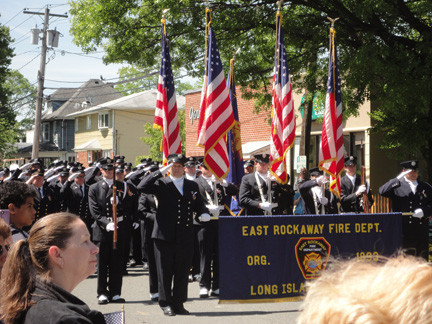 The East Rockaway Fire Department stood at attention for the Star Spangled Banner