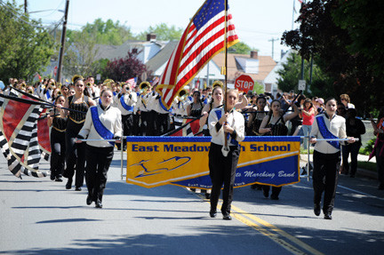 The East Meadow High School band marched and performed on Monday.