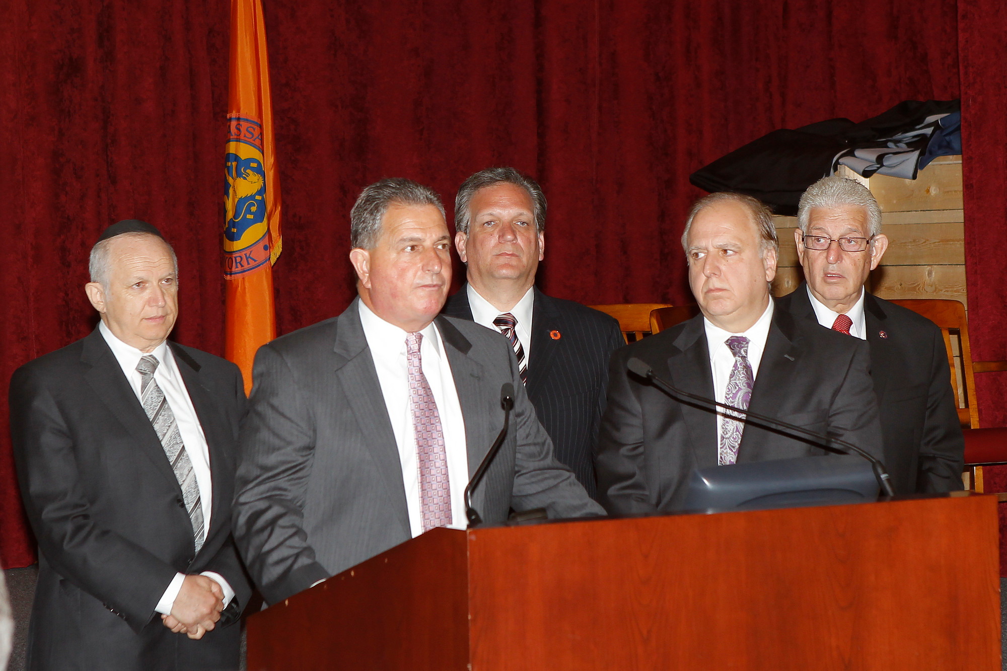 Chaim Weiss's father Anton Weiss, left, Detective Lt. John Azzata, County Executive Ed Mangano, Chief of Detectives Rick Capece and Police Department Rabbi Barry Dov Schwartz called on the public to help solve the 26-year-old case.
