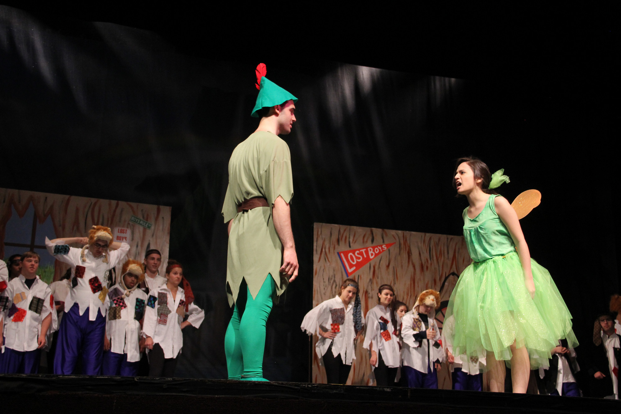 Tink, played by Jackie Cano, yells at Peter Pan, John Manna, right before she sings a solo of “We are Never Ever Getting Back Together” Pictured in the background are the Lost Boys