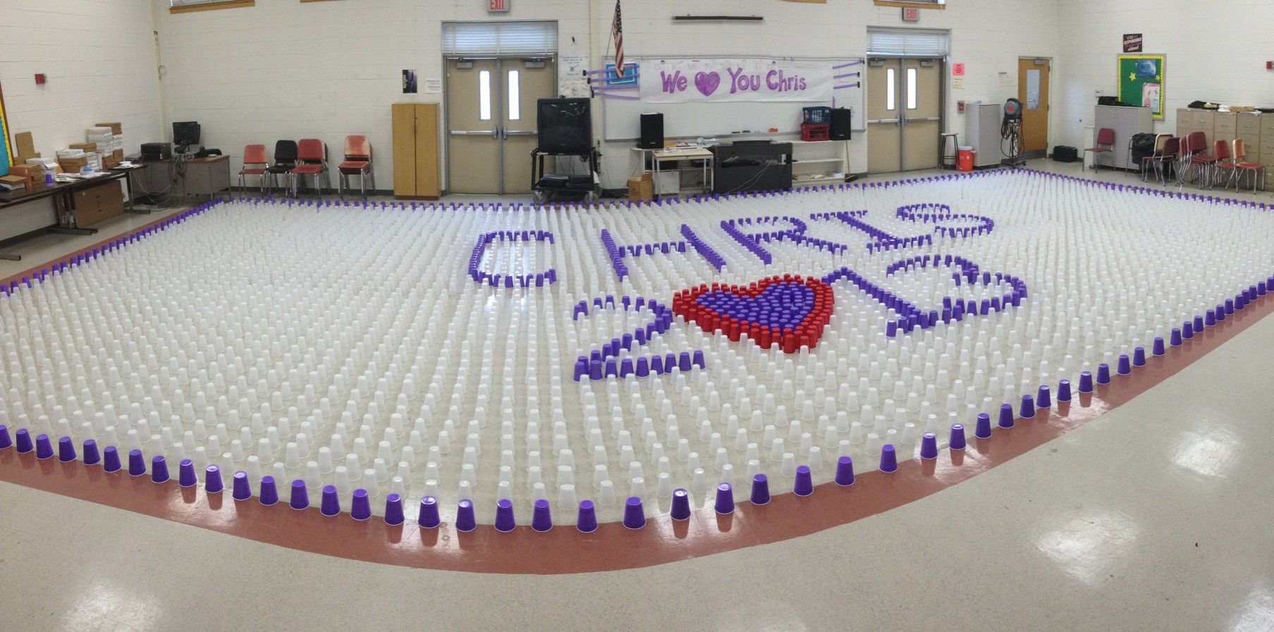 Students used cups to create a tribute to Chris Schroeder in South High’s chorus room after his death.