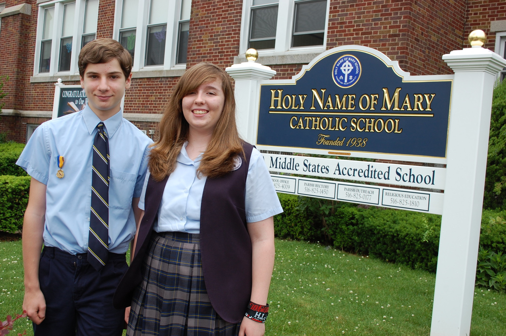 Daniel Bosko and Monica Ferrall are Holy Name of Mary School’s top graduates for the class of 2013.