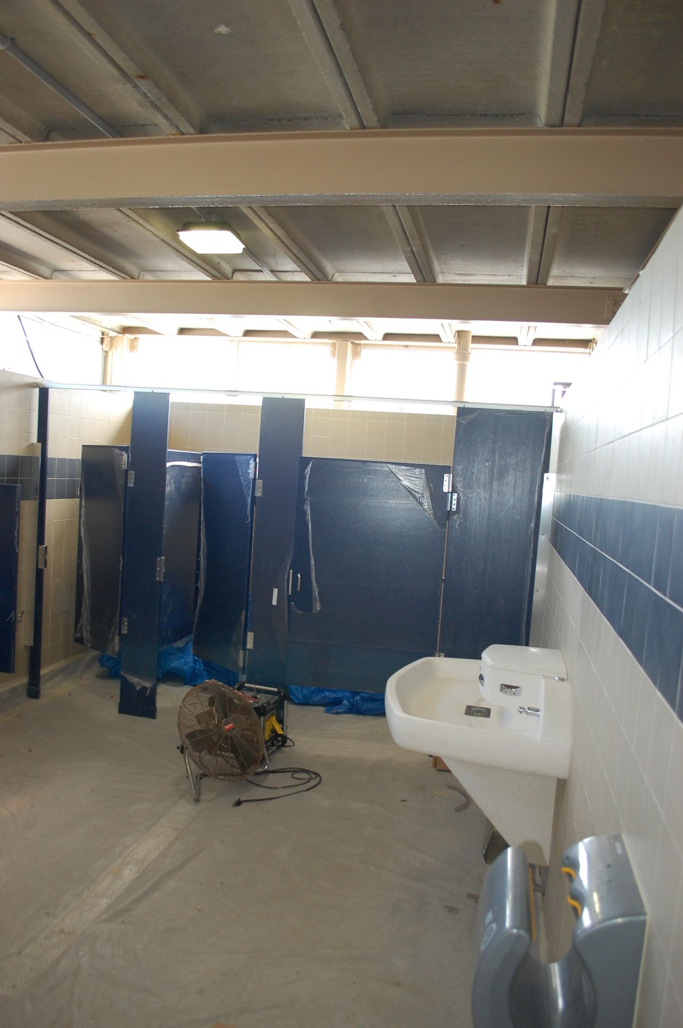 The renovated men's bathroom at the Valley Stream pool complex, a week before the facility opened for the 2013 summer season.