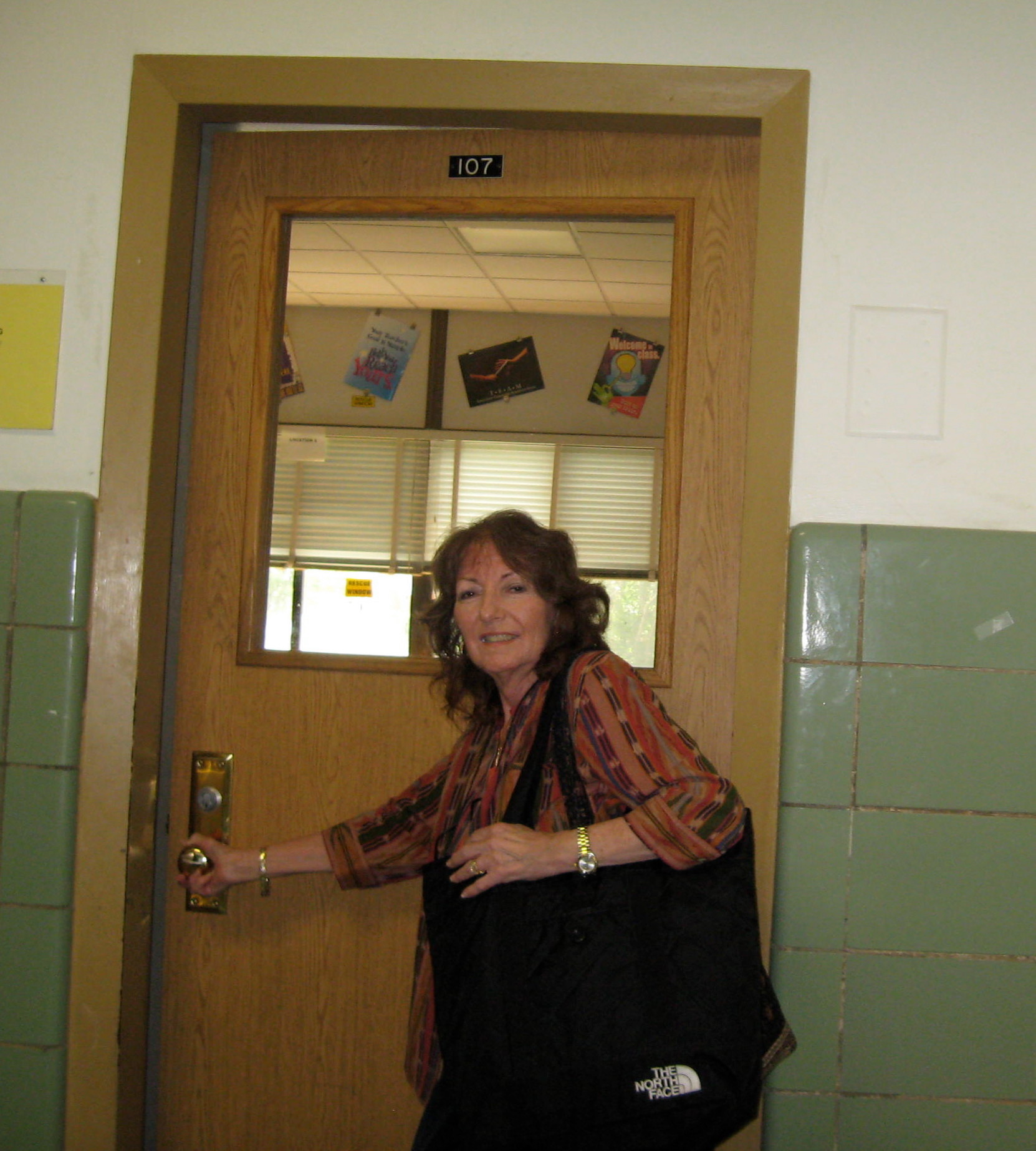 Stephanie Ginsberg at her classroom door at Memorial Junior High.