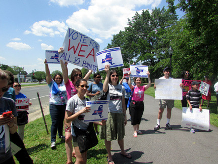 Protesters gathered on the westbound side of Sunrise Highway in Lynbrook last Saturday, calling on Sen. Dean Skelos to bring the Women’s Equality Act to the floor for a vote.