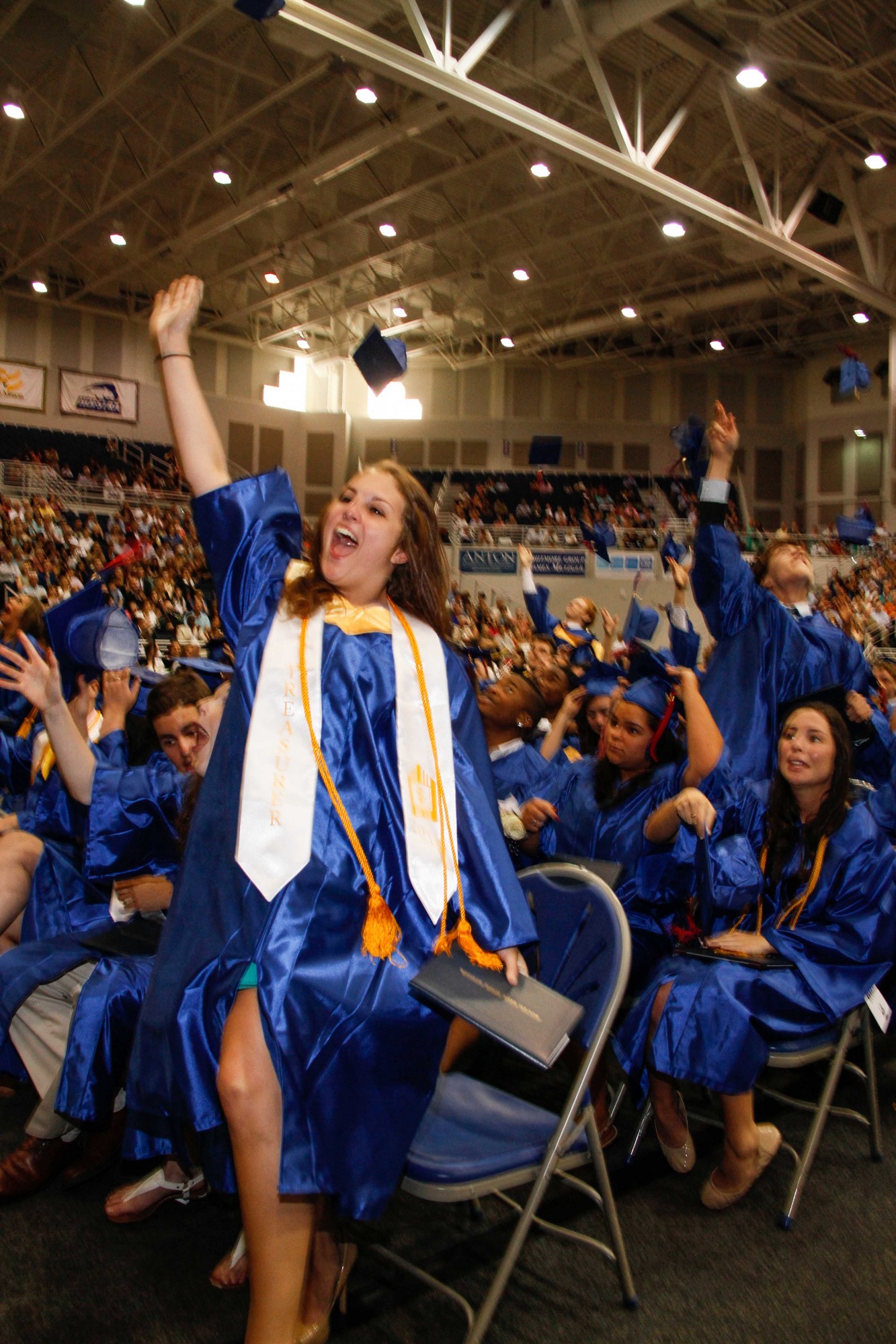 Jennifer Gentile jumped for joy as the class graduated.