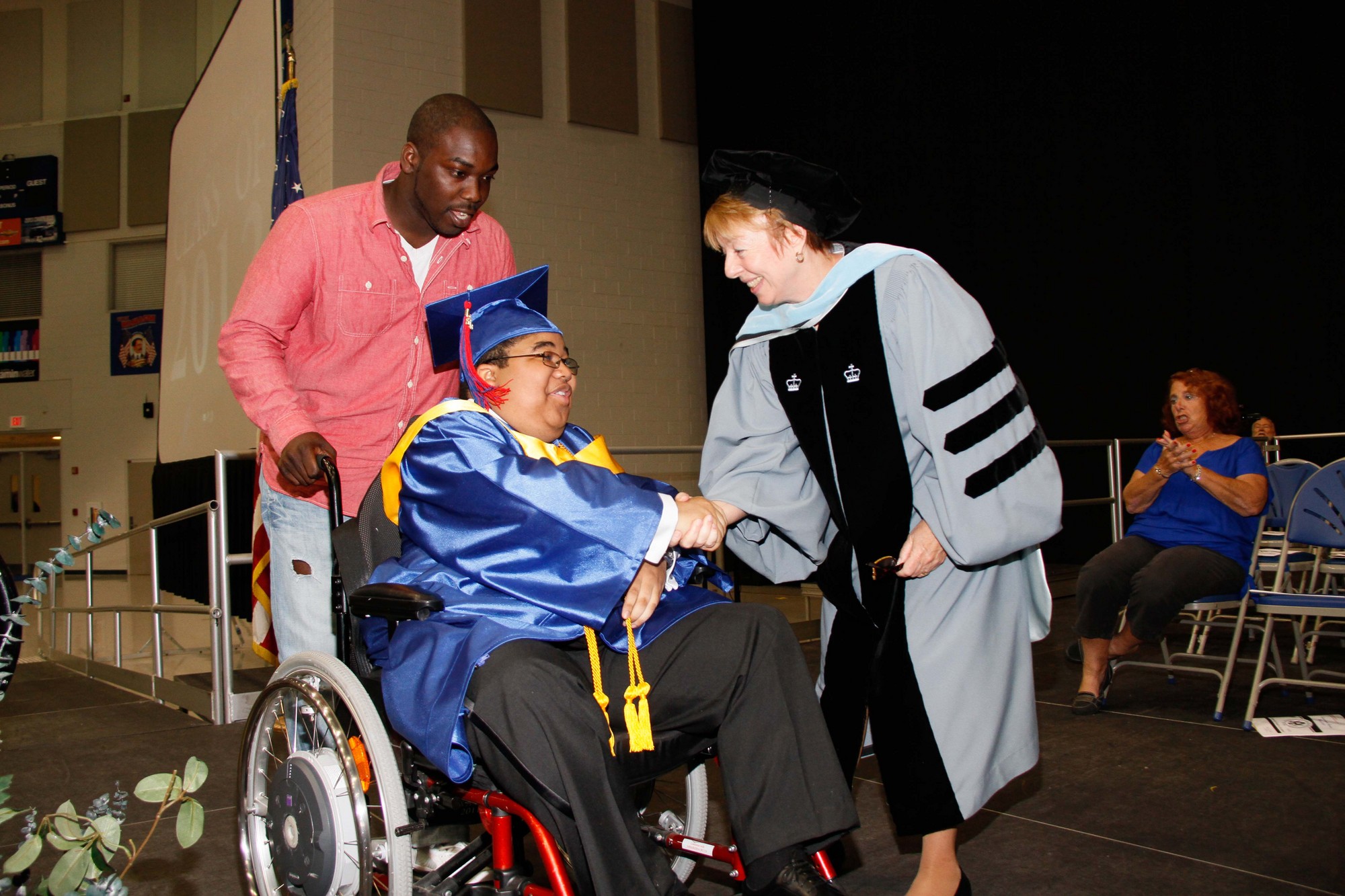 was awarded his diploma by South Side Principal Dr. Carol Burris.