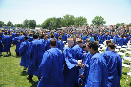The John Barbour Memorial Field was packed as graduates, school officials and family members arrived for the ceremony.