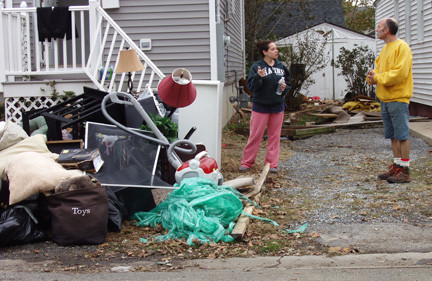Victims of Hurricane Sandy, like those pictured here in the days after the storm last October, can apply for financial assistance from the Robin Hood Foundation.