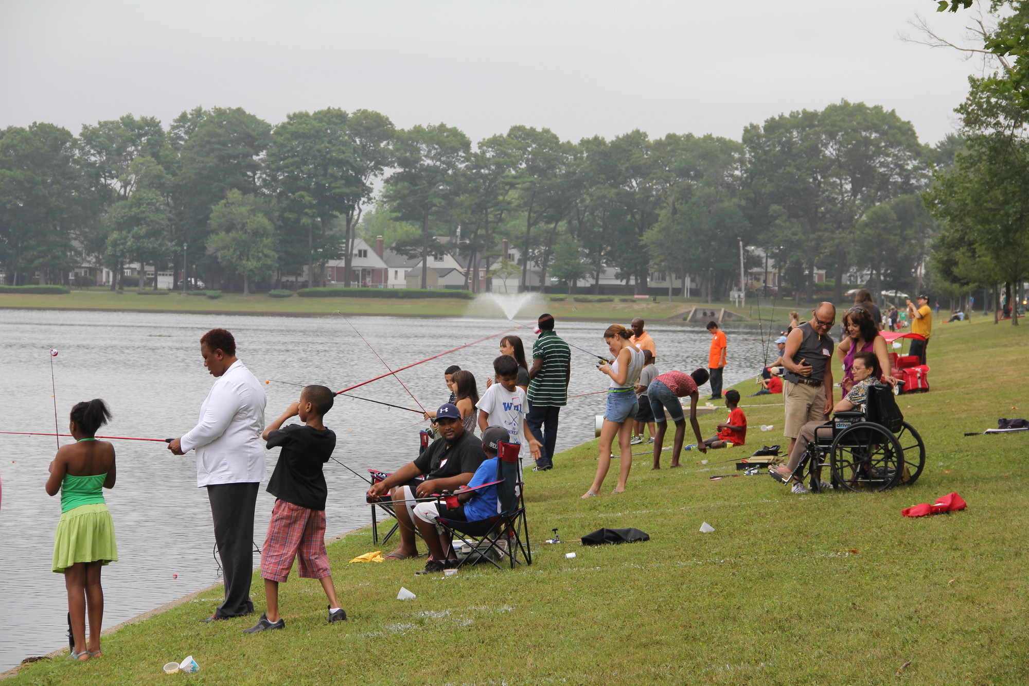 Residents lined the perimeter of the Hendrickson Park lake waiting to catch the big one in the first Family Fishing Weekend hosted by the village and the DEC.