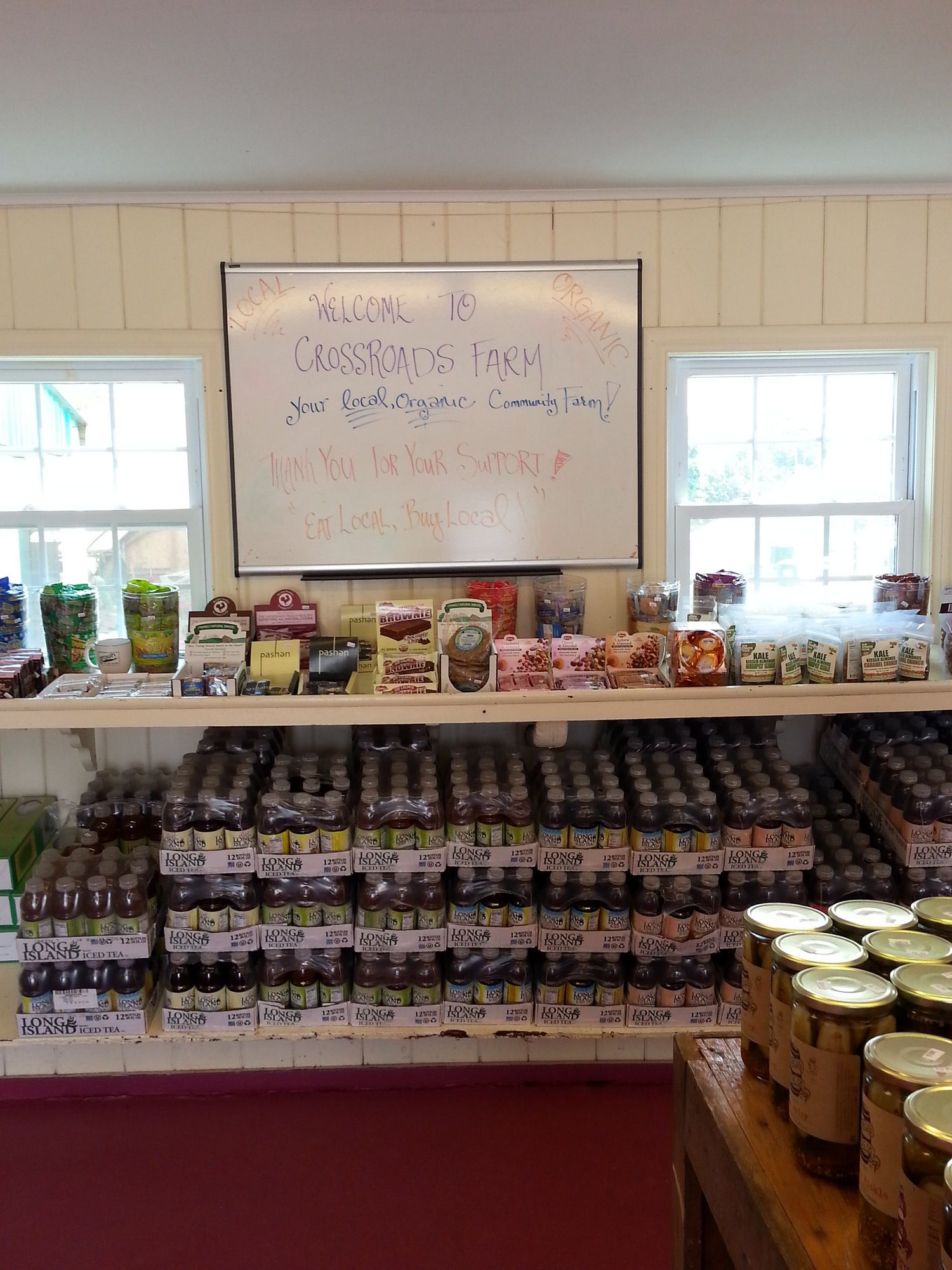 The farm stand at Crossroads offered a variety of organic health foods and baked goods, including organic nuts, dried fruits, trail mixes, brownies, cakes and cookies, fruit spreads and jars of honey from its resident beehive.