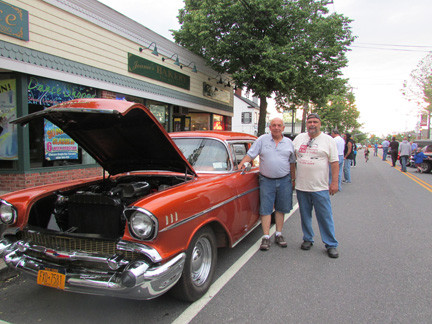 East Rockaway Car show Coordinator Rich Cittadino, left, invites the public to the Monday night summer cars shows on Main Street. On July 29, the event will be a fundraiser for Camp Anchor.
