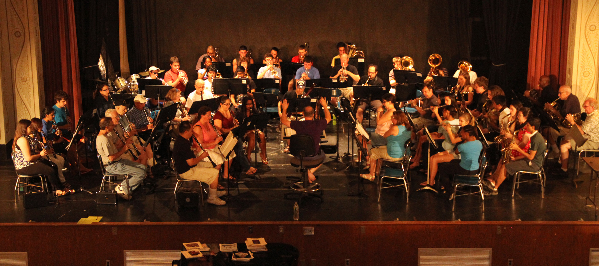 The Valley Stream Community Band rehearses in Central High School's auditorium.
