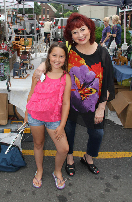 Skyla and Geralynn Marchesi had a great time walking the rows of vendors along Atlantic Avenue.