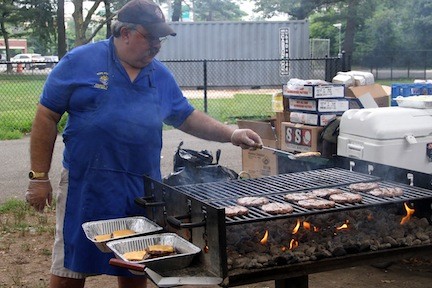 Past Grand Knight Al Clancy was a burger master on the grill.