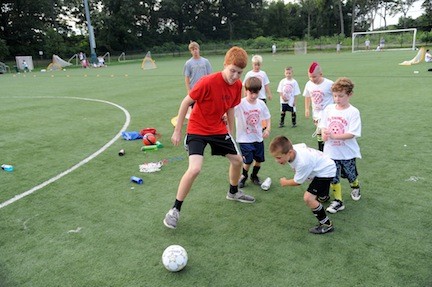 Andrew Livingstone, 15, 
practiced some drills with the kids.