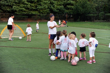 Teen coaches taught the kids the basics.