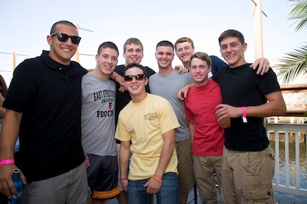 Former East Rockaway High SChool classmates, from left, Dylan Giliberti, Mikey Lores, Danny McClure, Joe Cantone (in sunglasses), Dave Blessington, Justin Jonas, John Tiki Parzych and Luke Fahrenkrug caught up at the fundraiser.