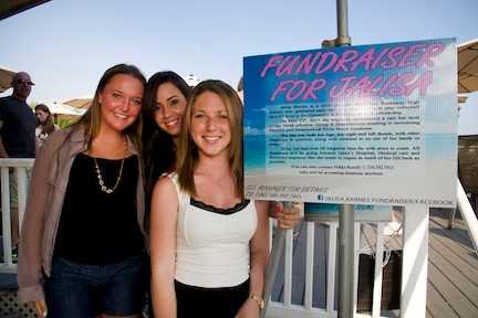 Event Organizers and former classmates Shannon Pujol, left, Briana Costanzo and Nikki Roeill welcomed hundreds of supporters to The Fishery for a fundraiser for their friend, Jalisa. Barnes.