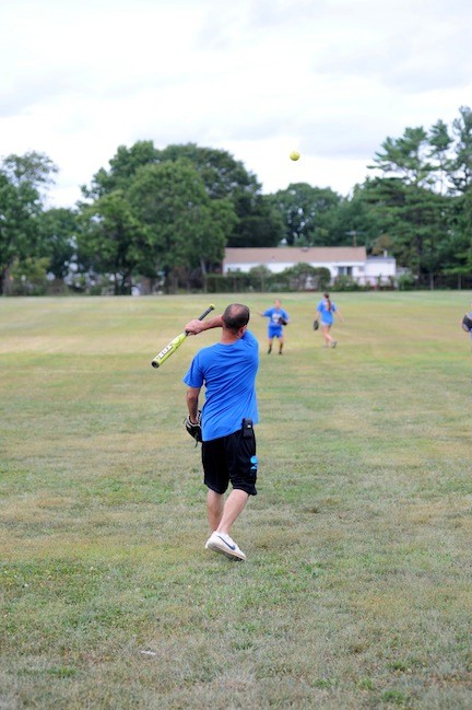 Manager John Duhs smacked fly balls to the girls, who worked on their fielding and cut-off throws.