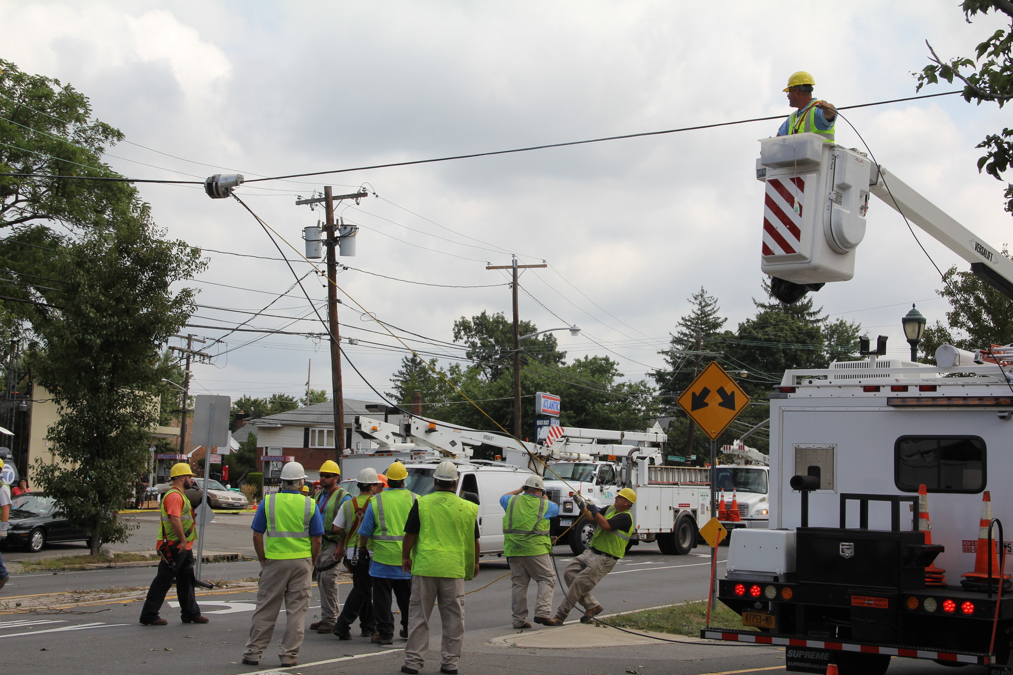 Utility crews work to repair the damage along Dutch Broadway in North Valley Stream on Tuesday.