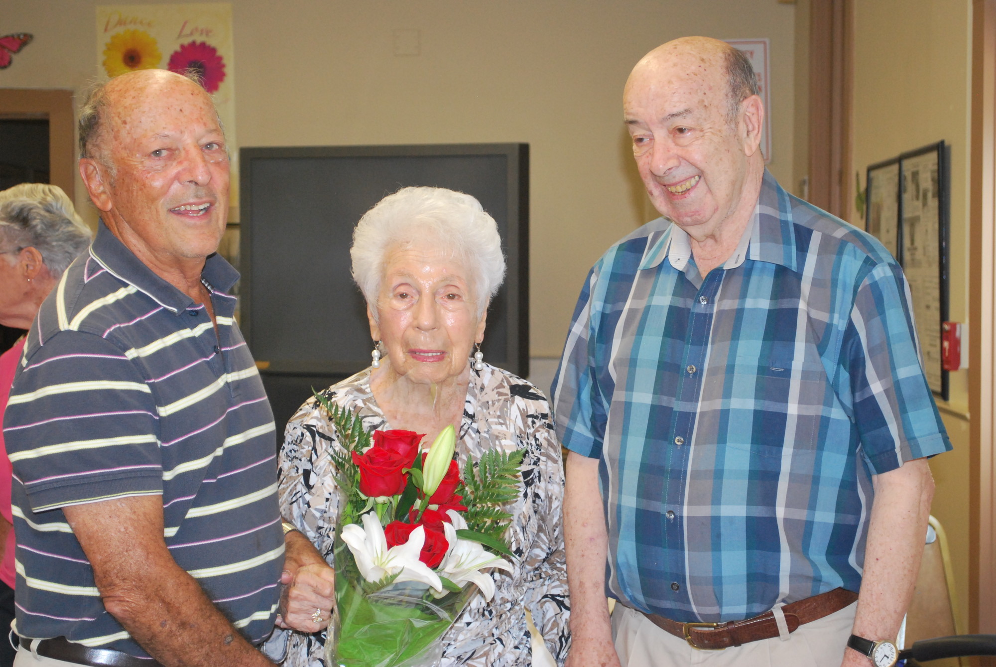 Playing bridge at the Center For Adult Life Enrichment is one way Henrietta Dobin remains busy. With fellow card players Victor Molinsky, left, and Irwin Sklar.