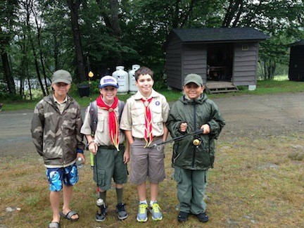 They were prepared: Boy Scouts Dan Schroeder, far left, Jack Kelly, Dan Varney and Luis Jimenez-Franco, of Rockville Centre's Troop 40, readied for a day of fishing, swimming, and hiking at Onteora Scout Reservation in Livingston Manor, N.Y.