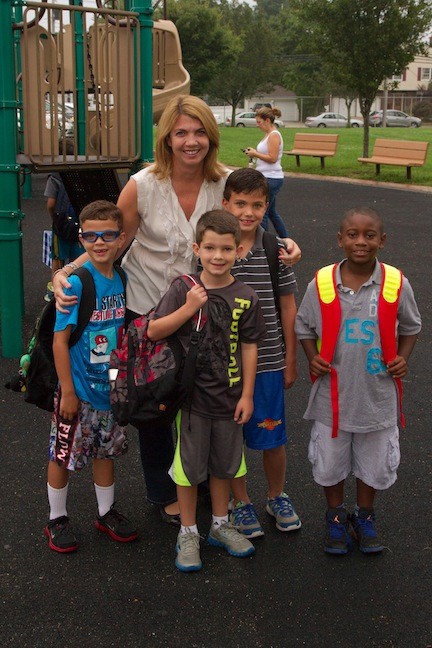 Liz Arnott with her sons Matthew and Sean, and their friend Michael Murray Oleafe.