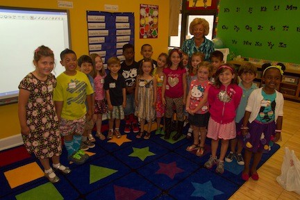 Principal Joan Waldman with a Kindergarten class at the Watson school.