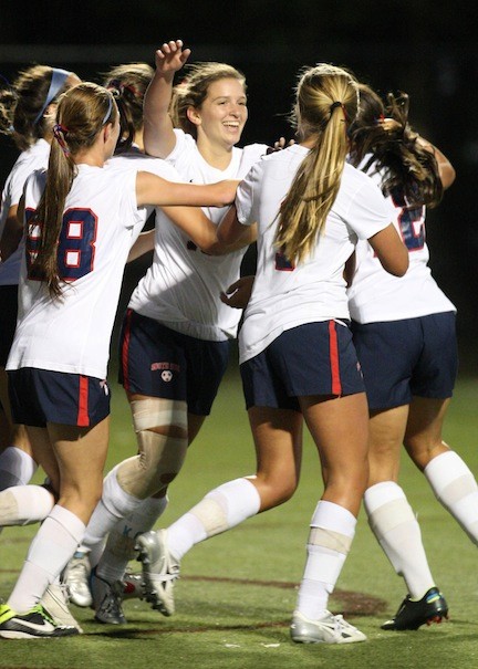 South Side’s Jessica Hawley, center, celebrates with teammates after scoring a goal in Monday night’s 3-0 win over Sacred Heart.