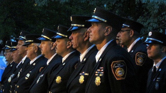 East Rockaway and Lynbrook held solemn ceremonies on Sept. 11 to honor local residents who lost their lives in the terrorists attacks in 2001. East Rocakway Fire Department Chief Ed Reicherter, foreground, with members of his department.