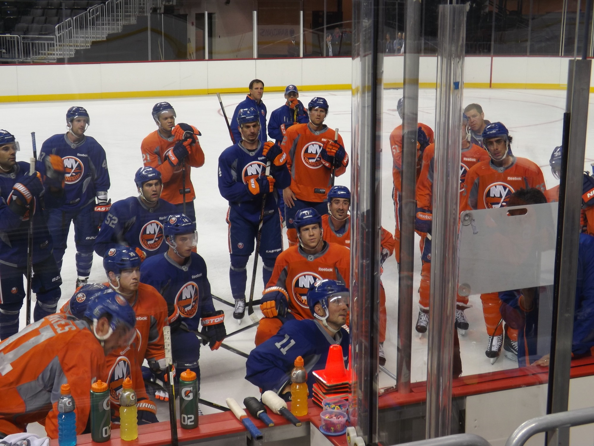 Islanders players watched as head coach Jack Capuano drew up the next drill.