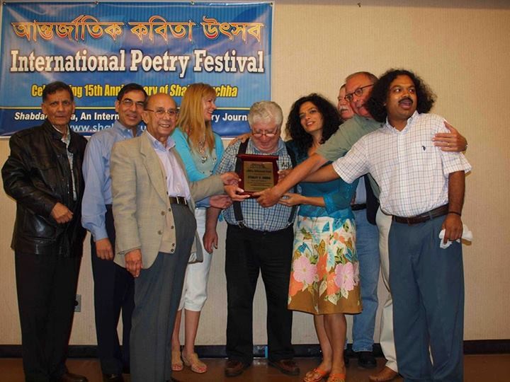 Merokean Stanley Barkan receiving the Shabdaguchha Poetry Journal’s Lifetime Achievement Award in August at the Queens Library in Jamaica.