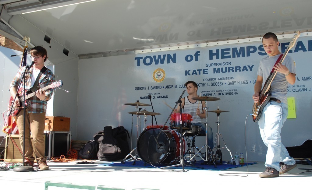 One of the first performances of the day on the Town of Hempstead showmobile was local band Schoeffel. From left are guitarist and lead singer Austin Schoeffel, drummer Michael Gallagher and bass guitarist Brandon Mirth.