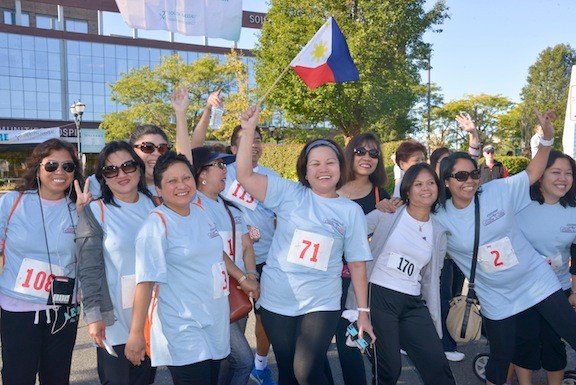 A group of hospital nurses and other employees show their allegiance as they begin the long walk.