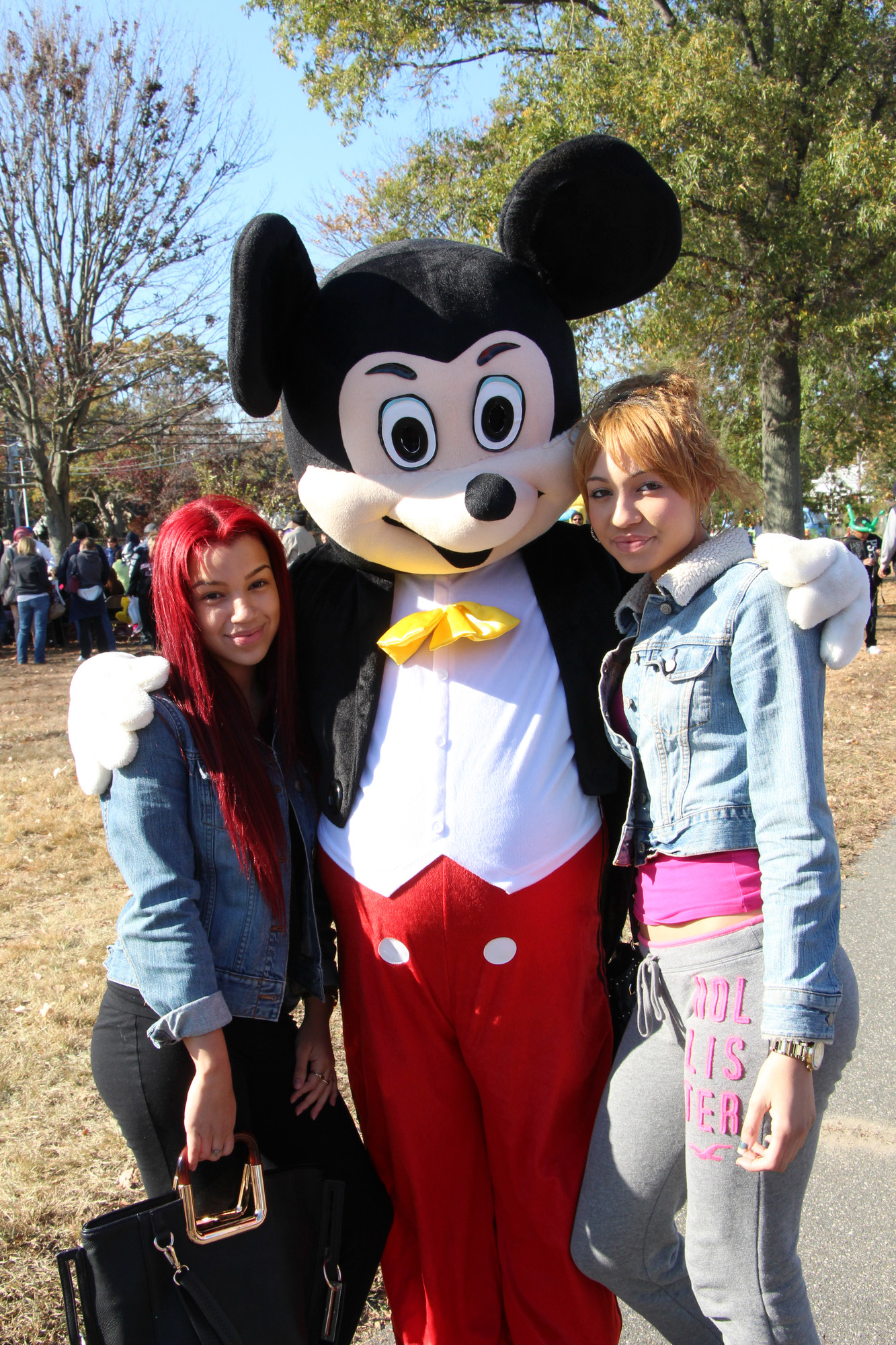 Jovanna and Jennisa Rodriguez met Mickey Mouse.