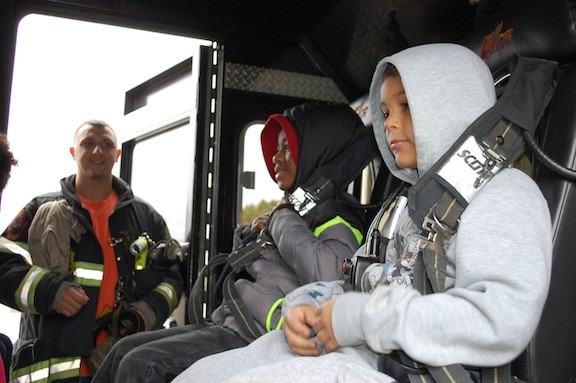 Valley Stream Firefighter Ryan Mastrangelo, of Engine Company No. 2, introduced students to the back seat of a fire truck during a fire safety presentation on Oct. 23 at the William L. Buck School.