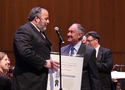 Rockville Centre mayor  Francis X. Murray presented Neil Sedaka with a citation from the village.