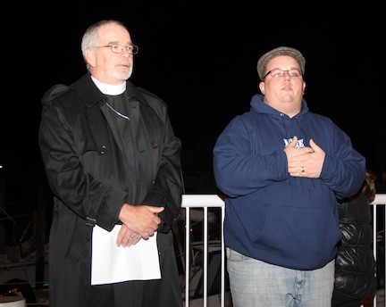The Rev. Mark Lukens, pastor of Bethany Congregational Church, and Dan Caracciolo, founder of the support organization the11518, spoke at the ceremony.