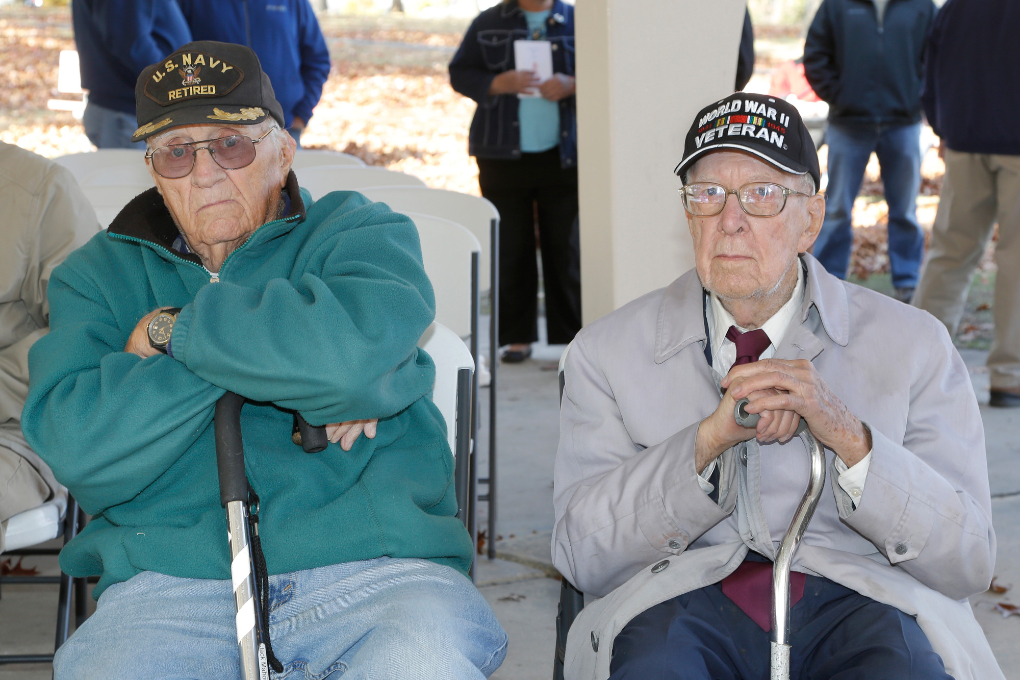 U.S. Navy pilot John Mahoney, left, and U.S. Army veteran Walter Harrod attended Monday afternoon