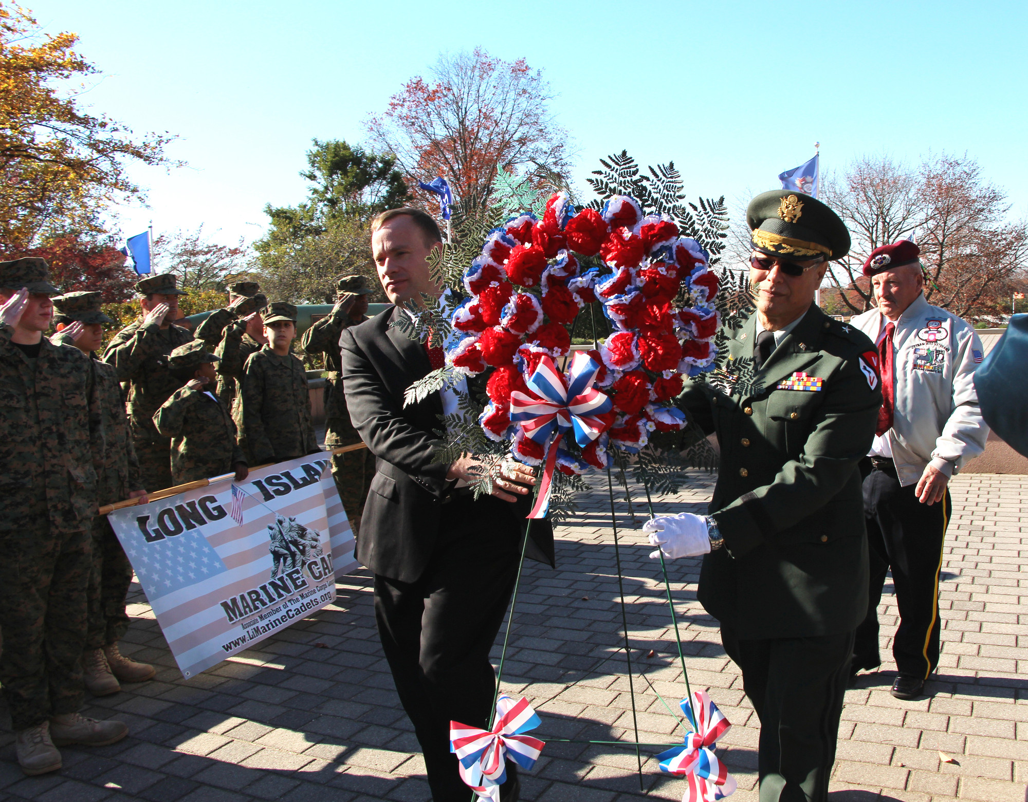 Frank Colon, Jr., left, president of the United Veterans Organization of Nassau County, and Lt. Colonel Joseph Reale led the memorial wreath presentation.
