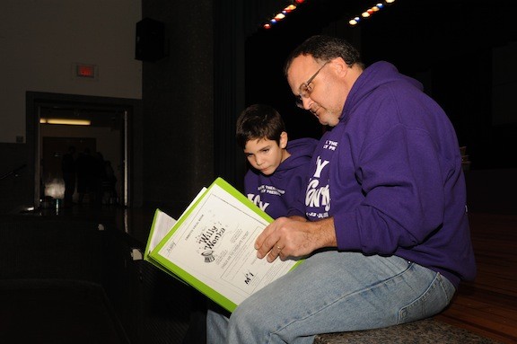 Ben Upbin and his dad, Andrew, go over their lines before a run-through.
