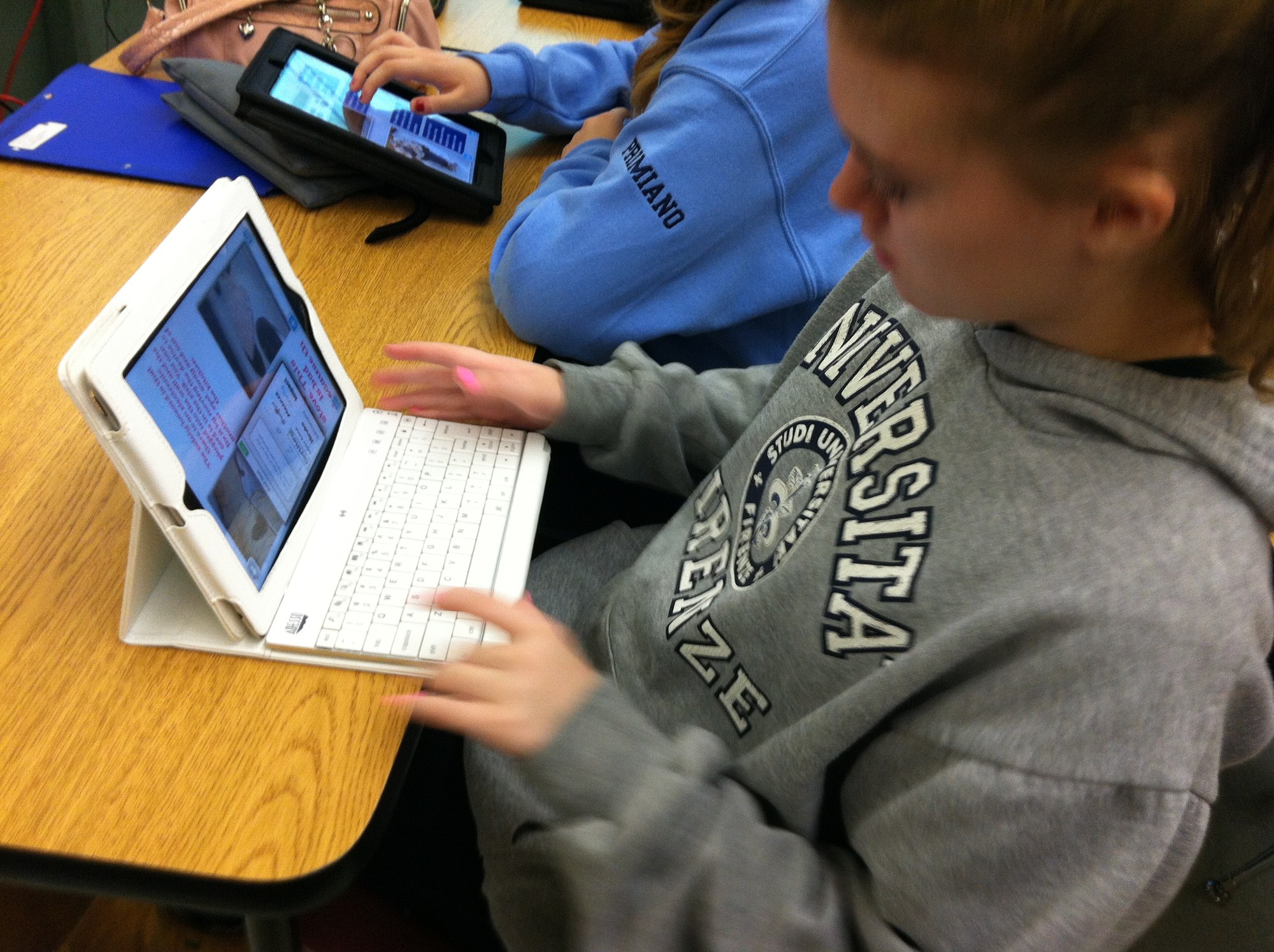Oceanside Middle School students utilizes iPads during a lesson late last month.