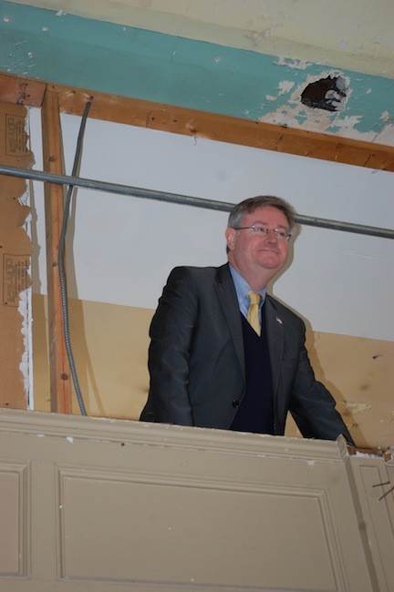 Judge Robert Bogle looks over his future courtroom from the mezzanine level.