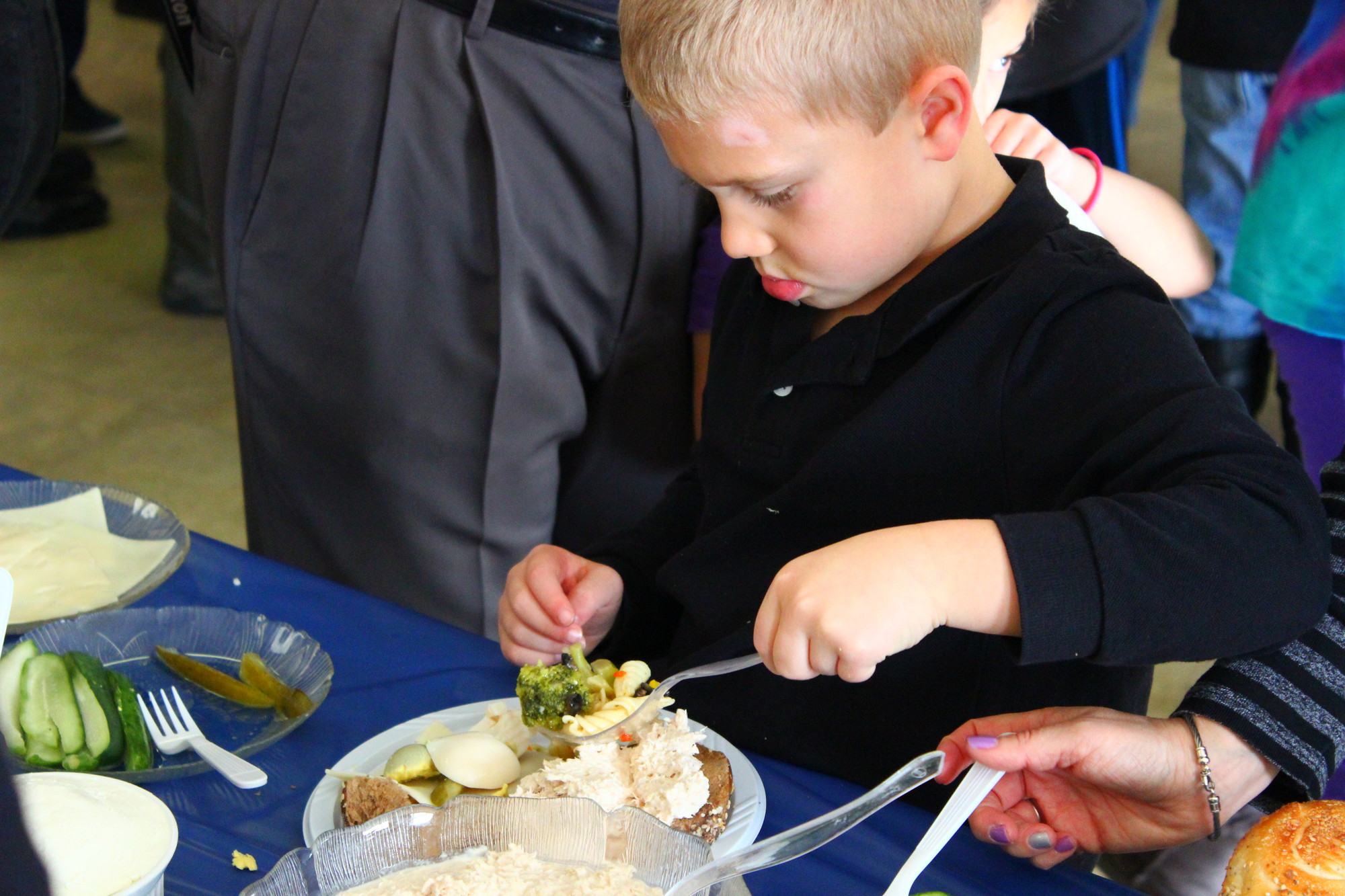 Ryan Jacobs, one of Temple Emanu-El’s younger congregants, enjoyed a holiday meal.