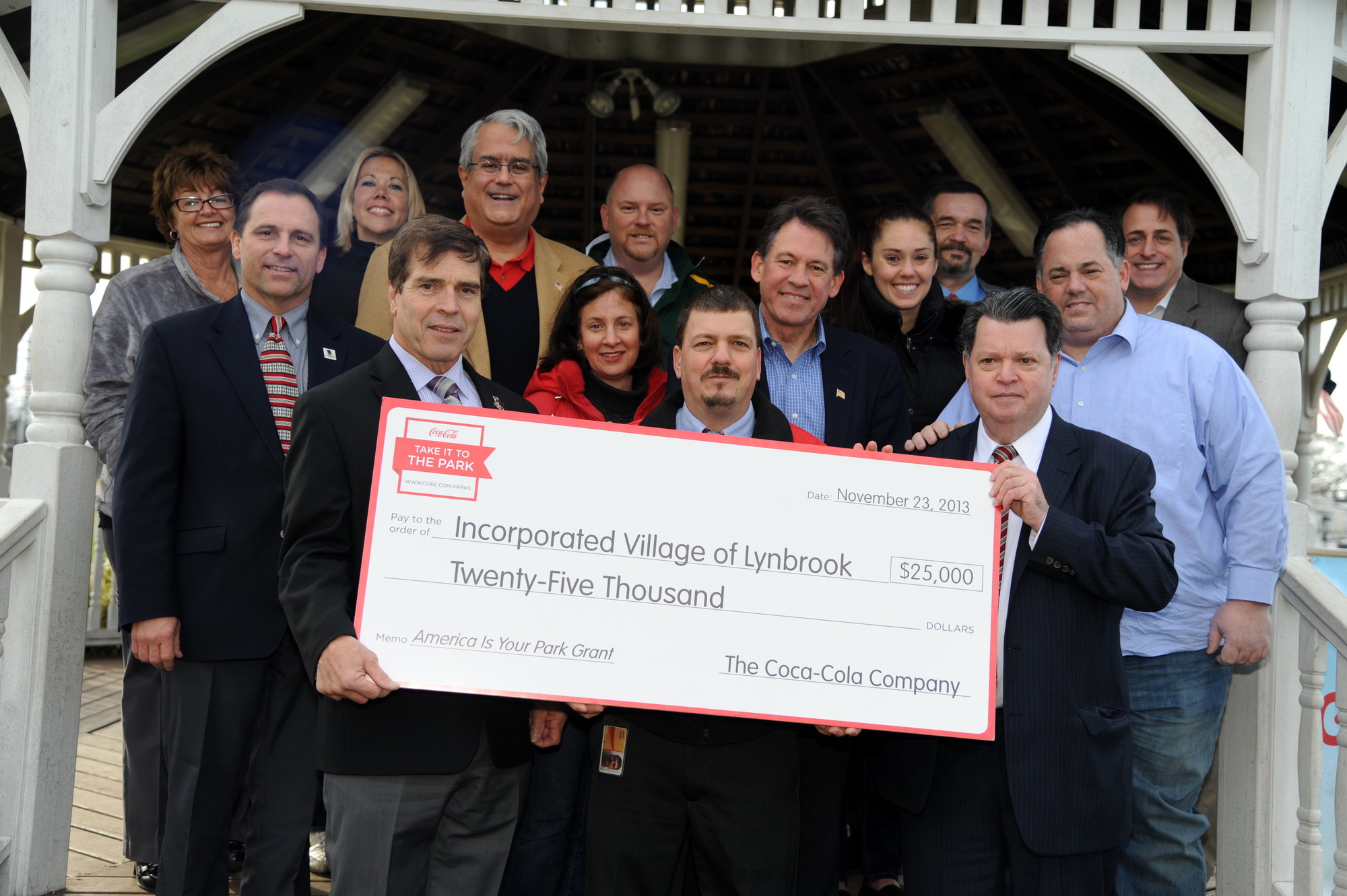 Coca-Cola representatives presented a $25,000 check to the Village of Lynbrook on Nov. 23 for Greis Veterans Memorial Park taking third place in its 'America is Your Park' campaign.