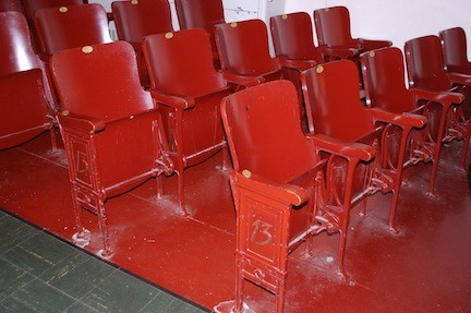 The original seats in the Wheeler auditorium will be replaced but board members want to keep the side posts with the District 13 insignia.