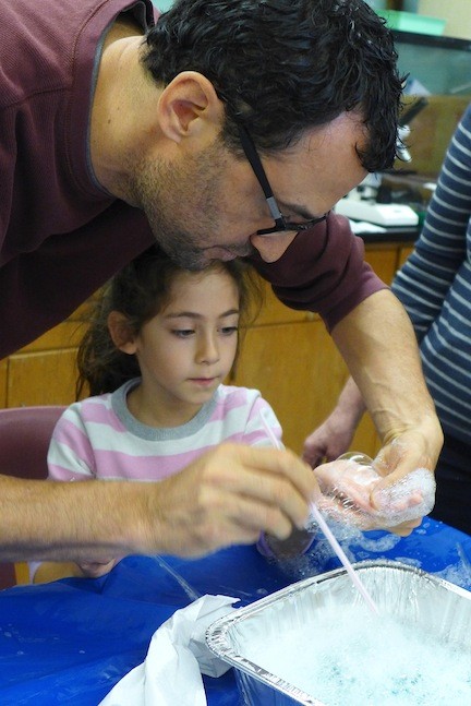 First Grader Torin Gaioni and her dad, Elijah, experimented with bubbles.