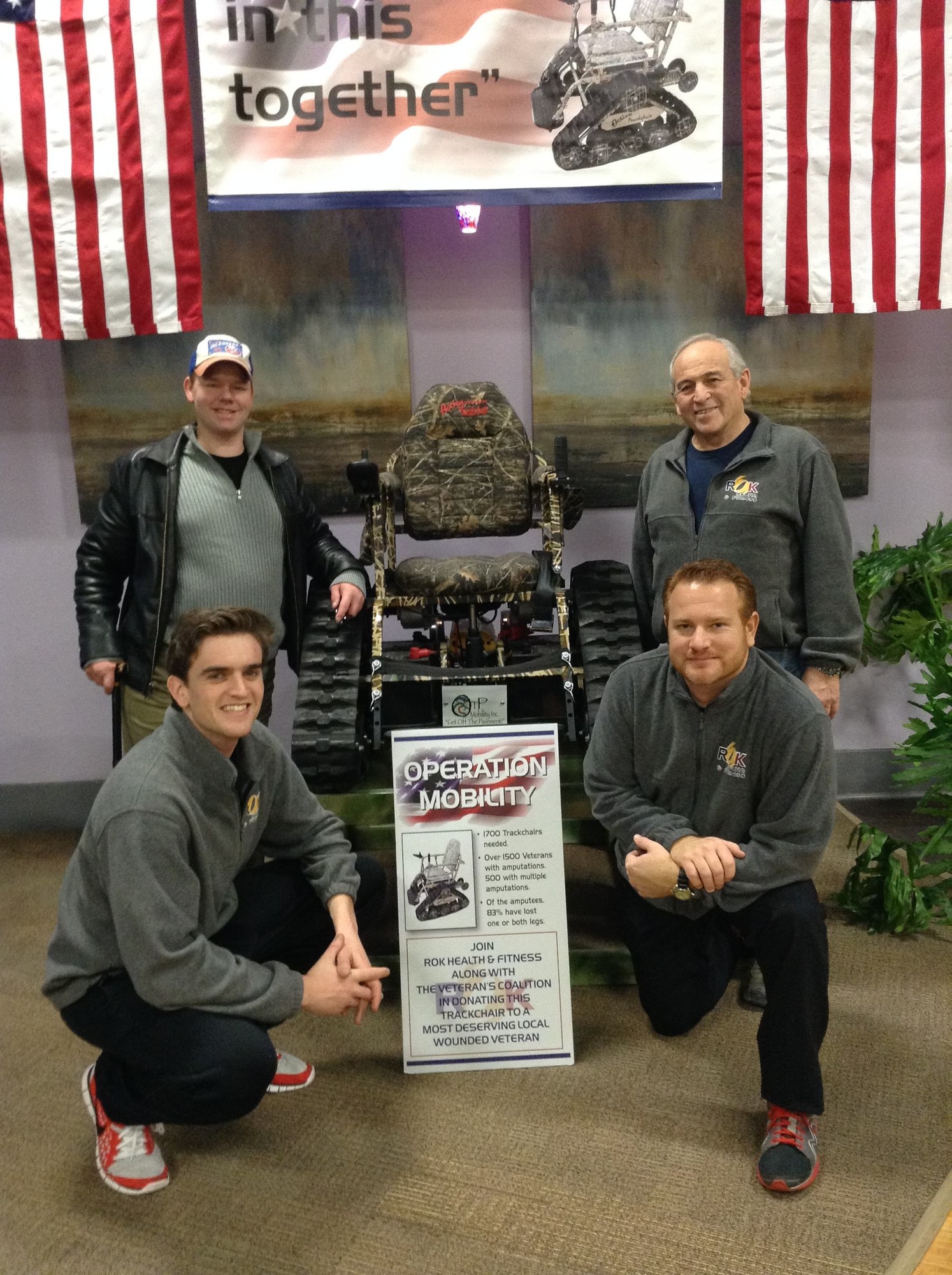 Wounded Veteran Chris Levi was the recipient of the Actiontrack Chair. He is pictured with co-owners Bob D'Urso, top right, Mike Hawksby, bottom right, and Director of Operations Craig D'Urso.